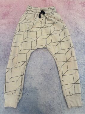 nununu Cream Joggers with Black Geometric Lines